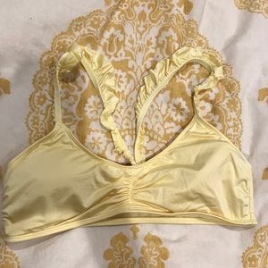 American Eagle ruffled yellow swim top